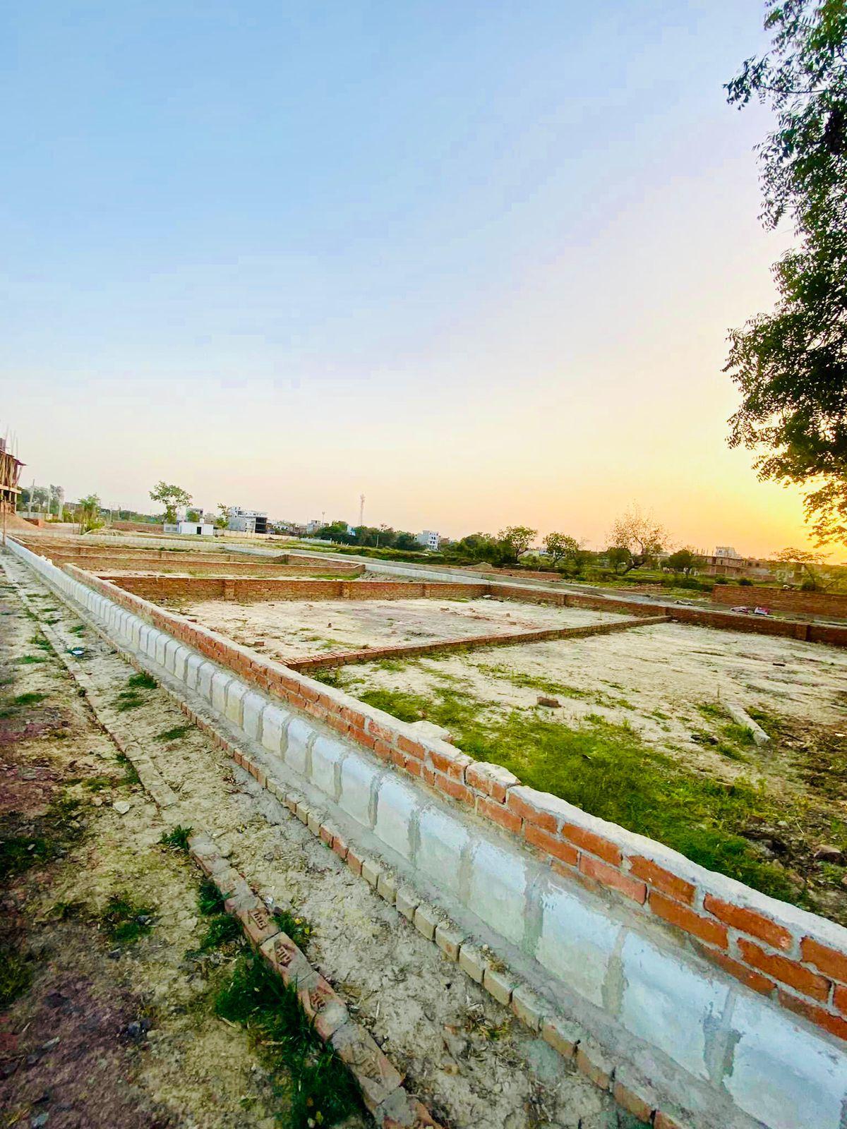 Plot on Nagram Road near Khujauli Market