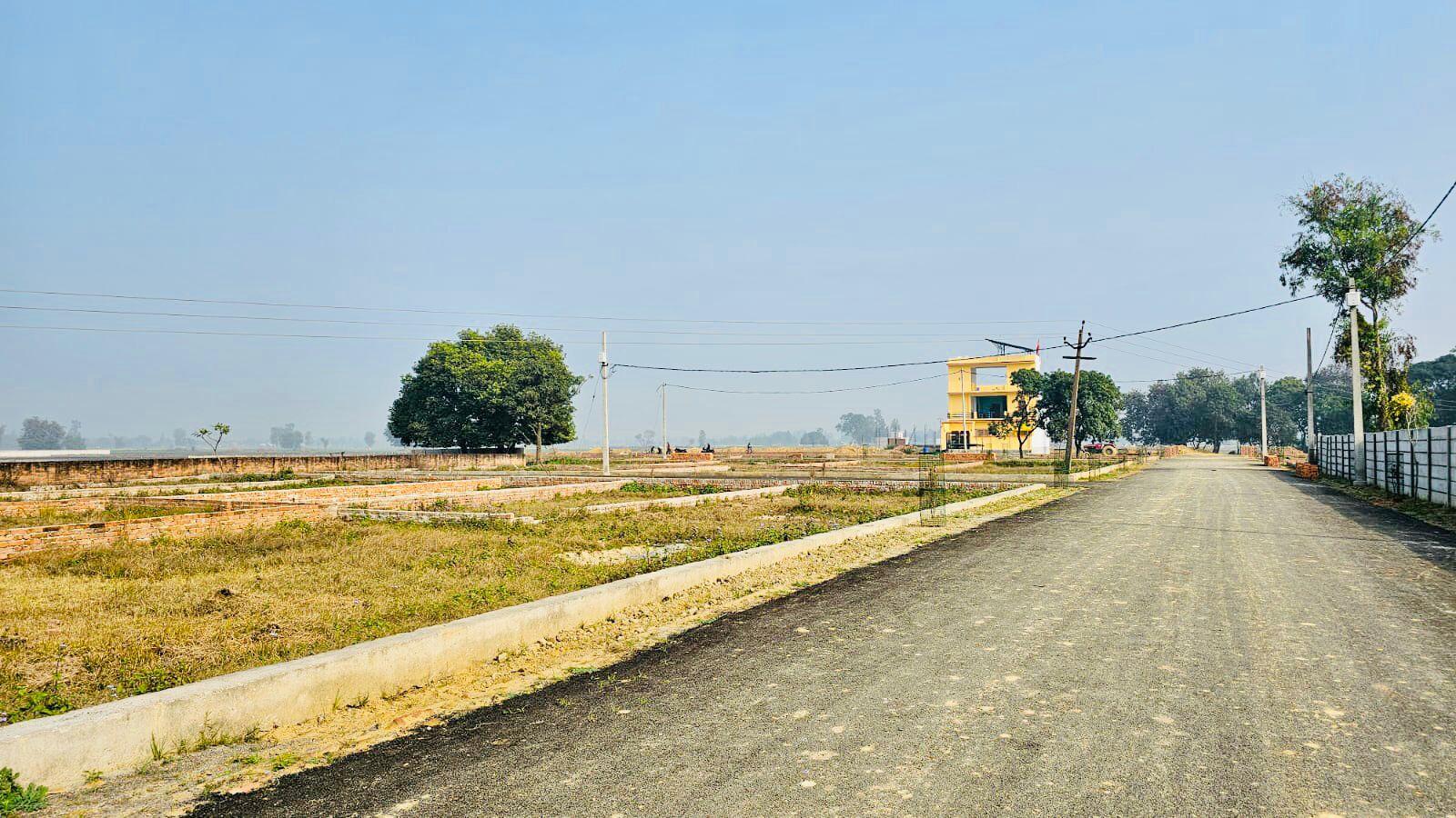 Plot on Nagram Road near Khujauli Market