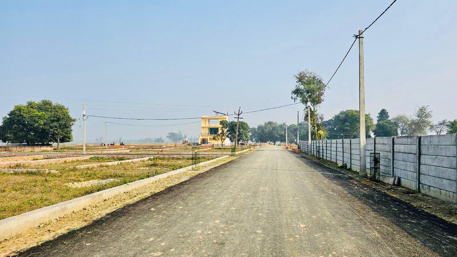 Plot on Nagram Road near Khujauli Market